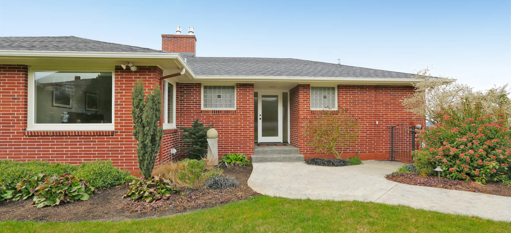 Brick Ranch With Garden Photo